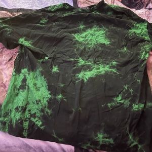 green and black tee